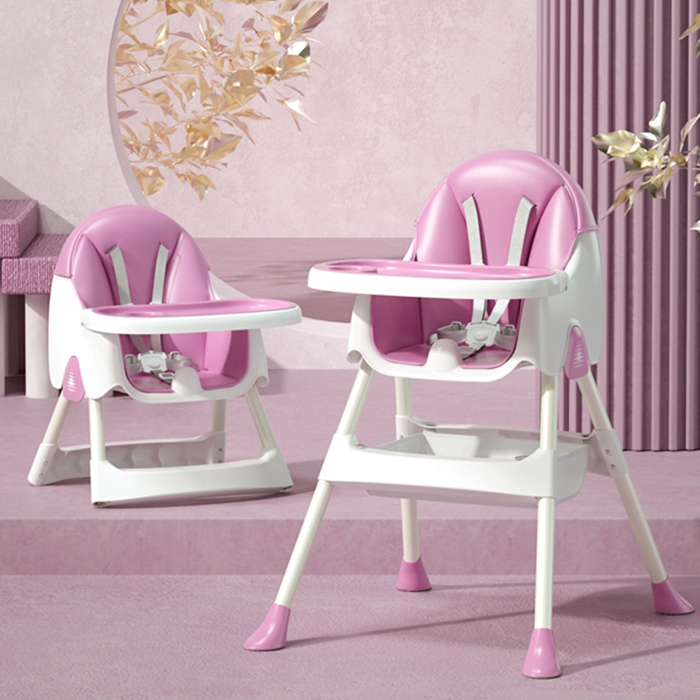 baby in pink high chair